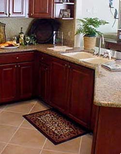 Ceramic tile floors in kitchen, baths and foyer - Choice of Mica, granite, corian or silestone kitchen counter tops